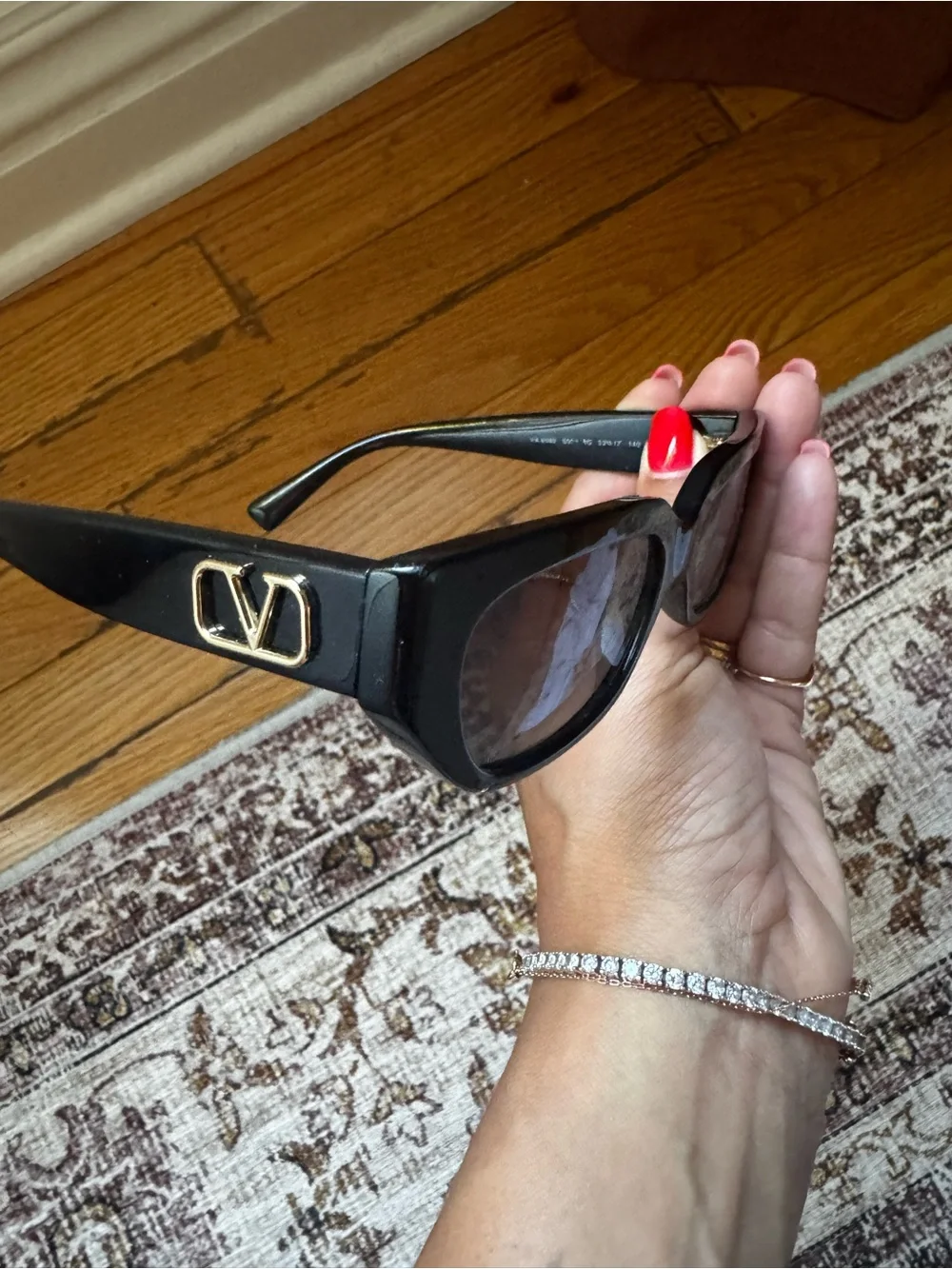 Valentino Black Sunglasses with Gold V Logo Accents